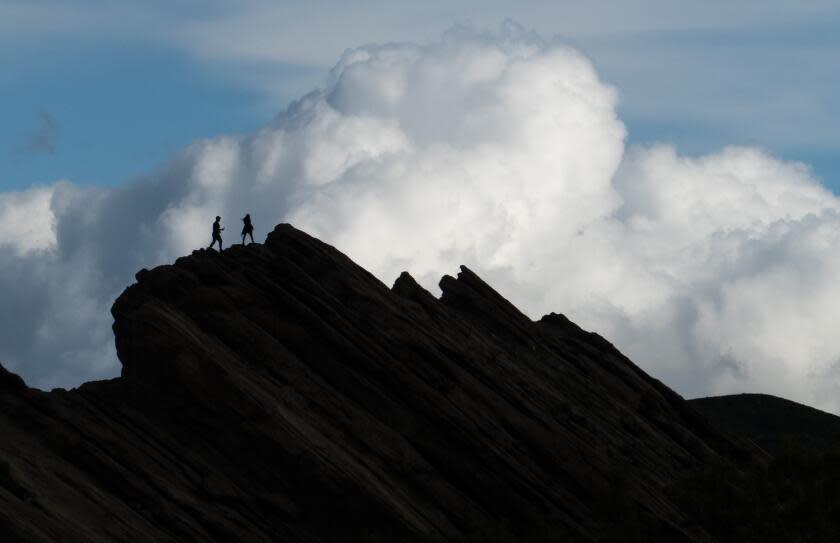 AGUA DULCE, CA - MARCH 15: Passing rain clouds enhance an already-dramatic landscape at Vasquez Rocks Natural Area in Agua Dulce, CA on Wednesday, March 15, 2023. (Myung J. Chun / Los Angeles Times)