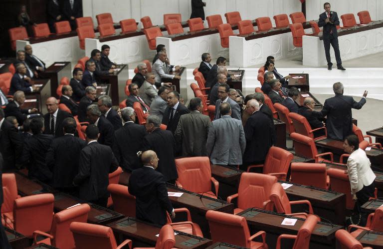 Turkey's main opposition Republican People's Party (CHP) members leave during the swearing in ceremony for Turkey's new president Recep Tayyip Erdogan (unseen) at the parliament in Ankara on August 28, 2014