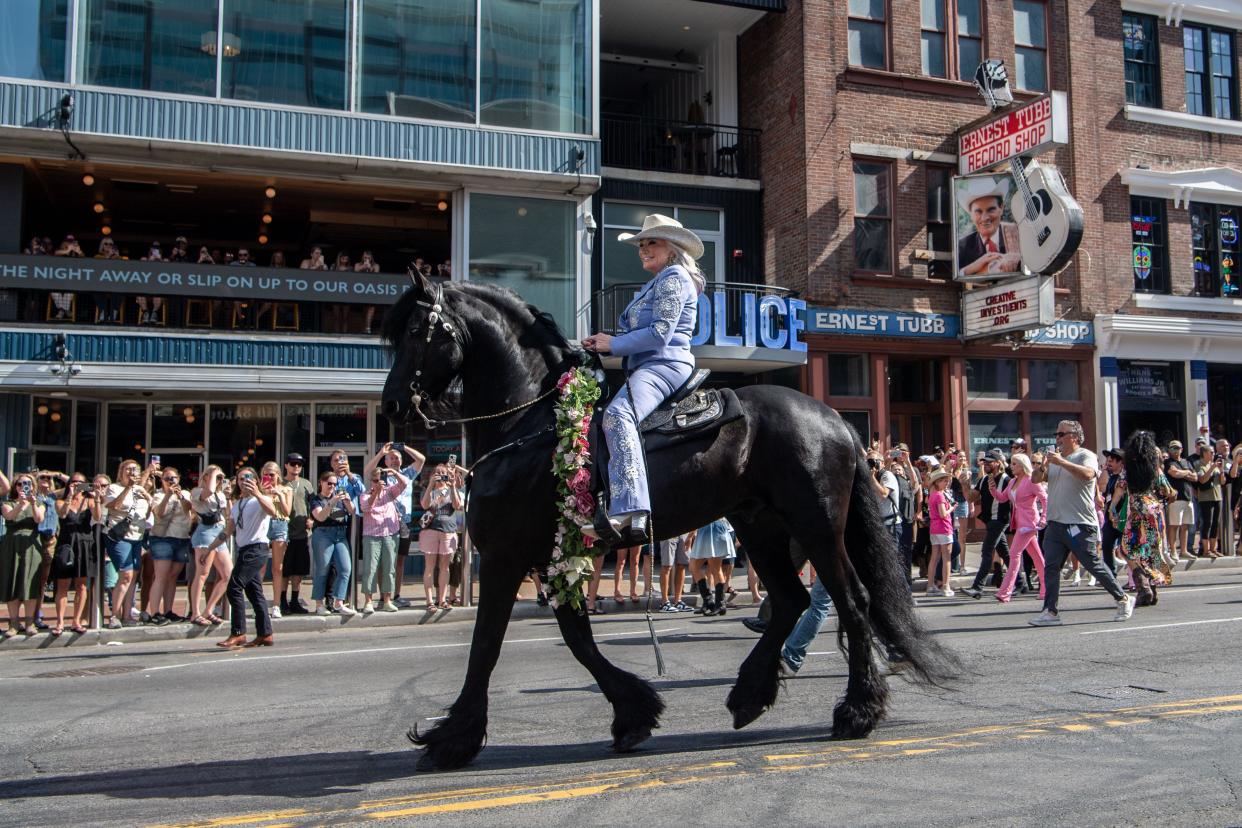 Tanya Tucker rides Lauw the Magnificent on Broadway as a grand entrance for her pop-up bar Tanya Tucker’s Tequila Cantina at the Nudie’s Honky Tonk in Nashville, Tenn., Thursday, May 2, 2024.