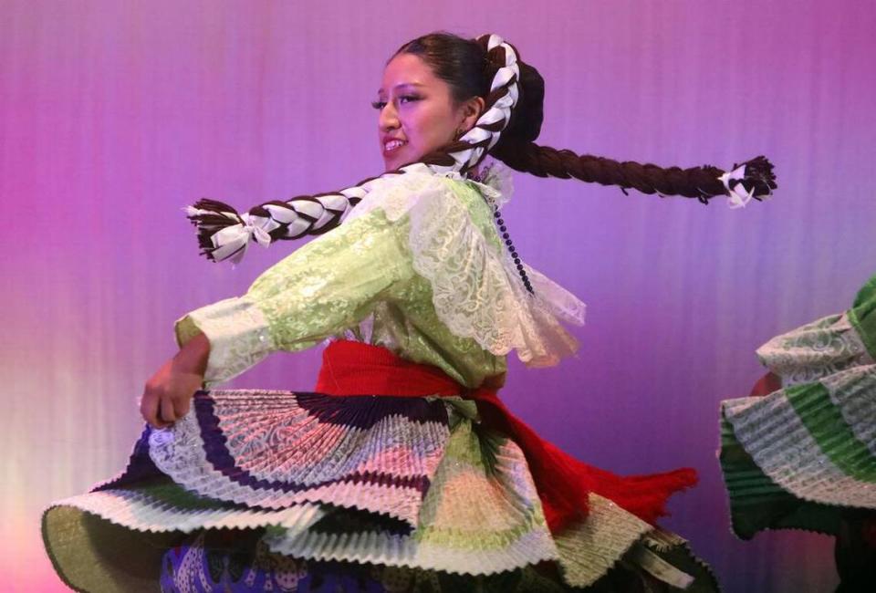 Yaretzi Carrasco performs ‘La Botella’ from the state of México’ at the Central East Danzantes de Tláloc 25th anniversary show at the Performing Arts Center on May 26, 2023.