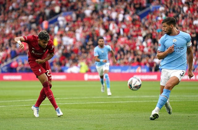 Luis Diaz takes a shot against Manchester City