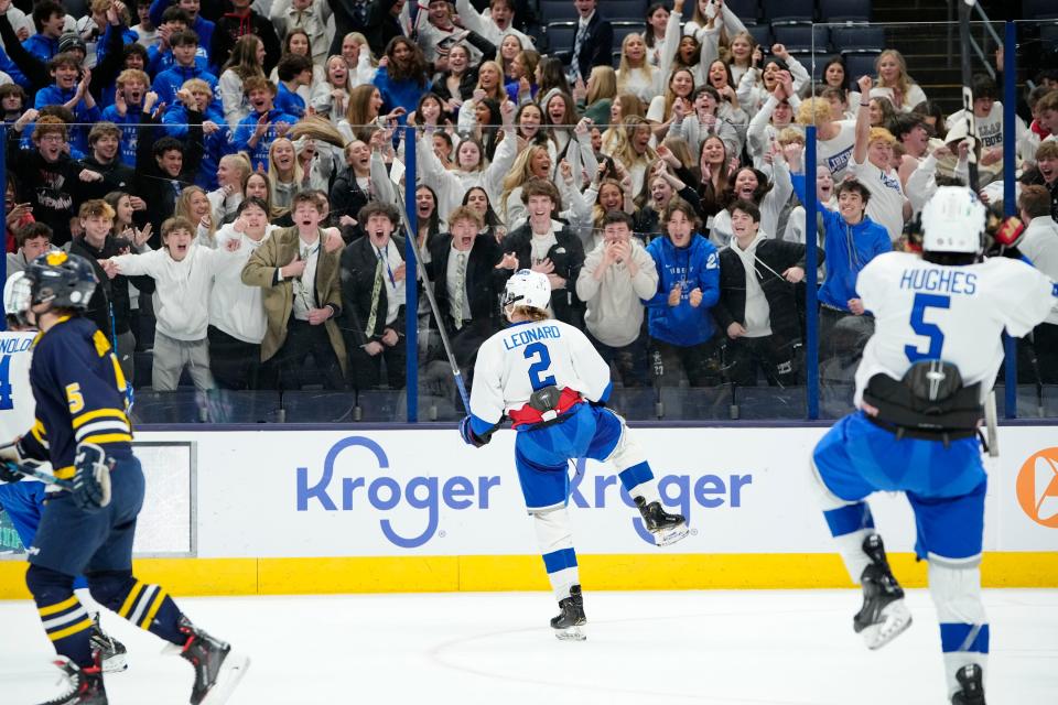 Mar 11, 2023; Columbus, Ohio, USA;  Olentangy Liberty forward Andrew Leonard (2) celebrates scoring a goal during the second period of the OHSAA state hockey semifinal against Cleveland St. Ignatius at Nationwide Arena. Mandatory Credit: Adam Cairns-The Columbus Dispatch