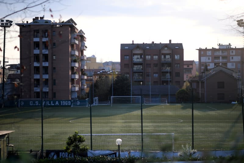 FILE PHOTO: A general view of an empty football field, as the spread of the coronavirus disease (COVID-19) continues, in Milan