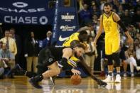 Mar 24, 2019; Oakland, CA, USA; Detroit Pistons forward Blake Griffin (23) and Golden State Warriors forward Draymond Green (23) battle for a loose ball in the fourth quarter at Oracle Arena. Mandatory Credit: Cary Edmondson-USA TODAY Sports