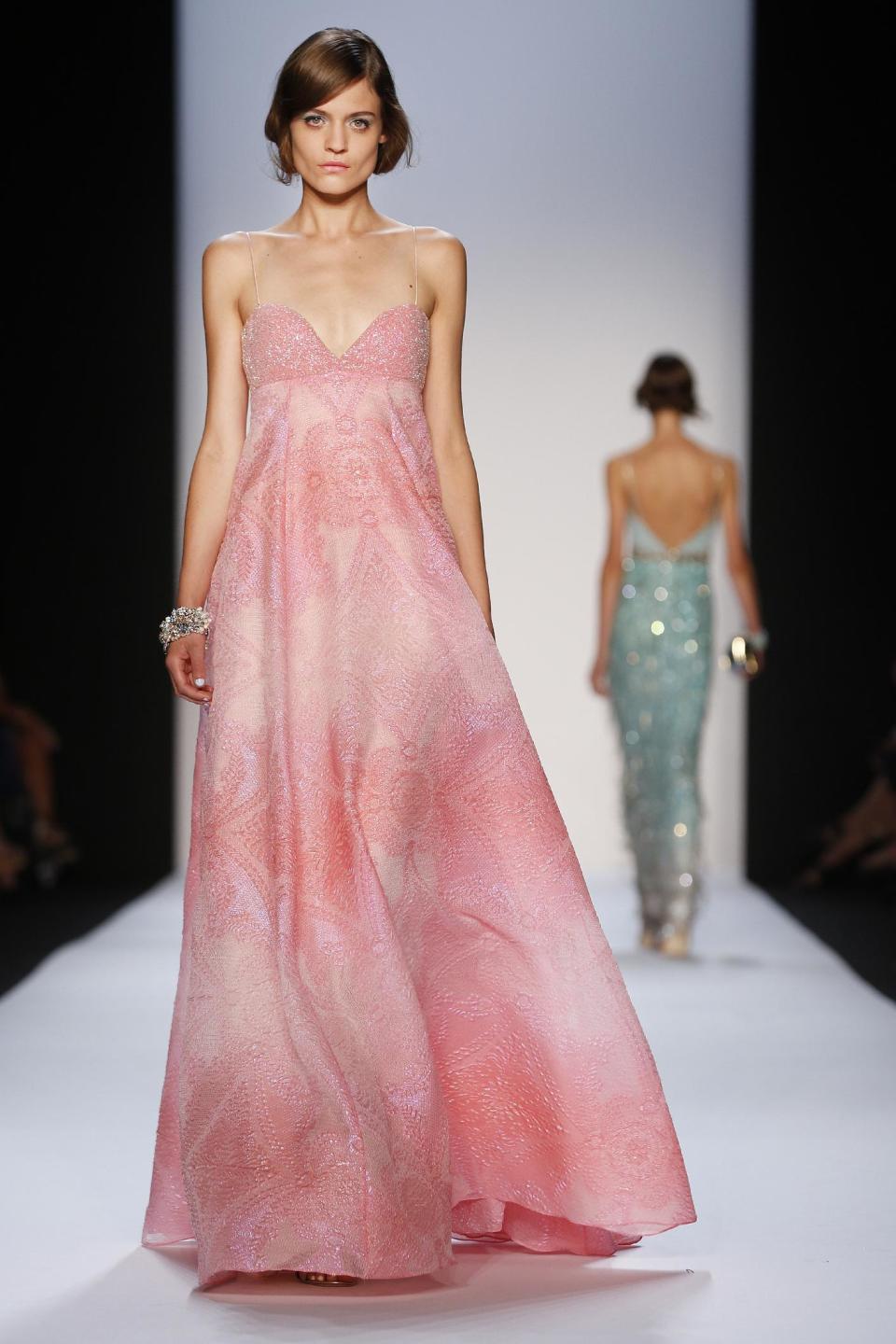 The Badgley Mischka Spring 2014 collection is modeled during Fashion Week in New York, Tuesday, Sept. 10, 2013. (AP Photo/John Minchillo)