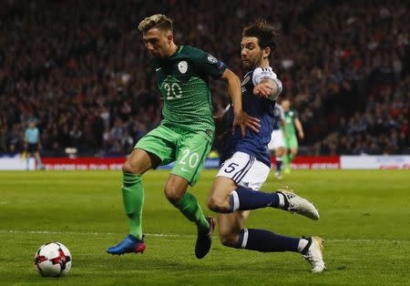 Britain Football Soccer - Scotland v Slovenia - 2018 World Cup Qualifying European Zone - Group F - Hampden Park, Glasgow, Scotland - 26/3/17 Slovenia's Kevin Kampl in action with Scotland's Charlie Mulgrew Action Images via Reuters / Jason Cairnduff Livepic