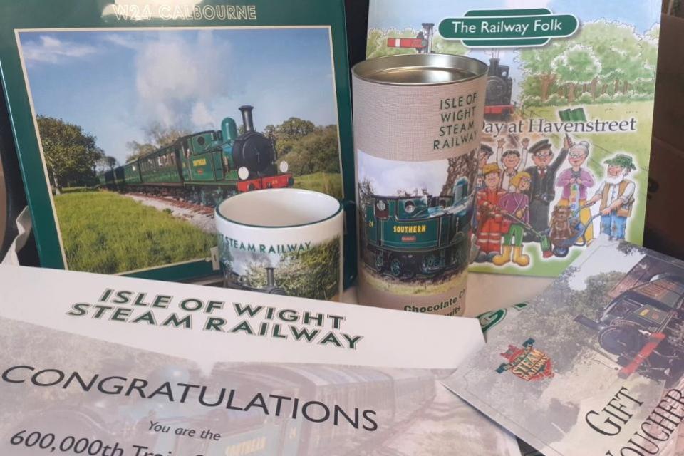 Isle of Wight County Press: Gifts in the goodie bag won by the Shitu family.