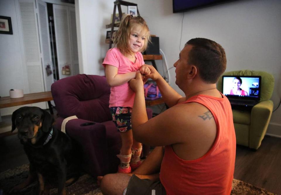 Firefighter Kyle Stromquist is a father figure and therapy partner to Brooklyn Grant.