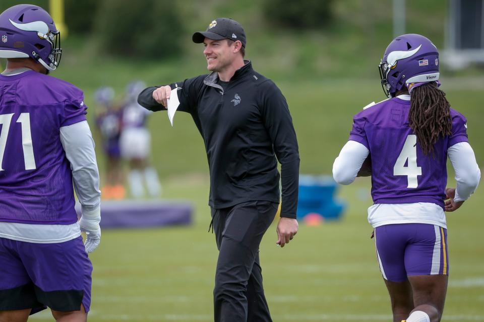 nnesota Vikings coach Kevin O'Connell directs players during drills at the NFL football team's practice facility in Eagan, Minn., May 17, 2022