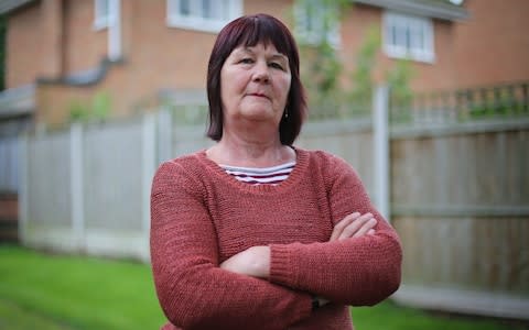 Sue Brookes has suffered a lengthy campaign of terror by her neighbour - Credit: SWNS