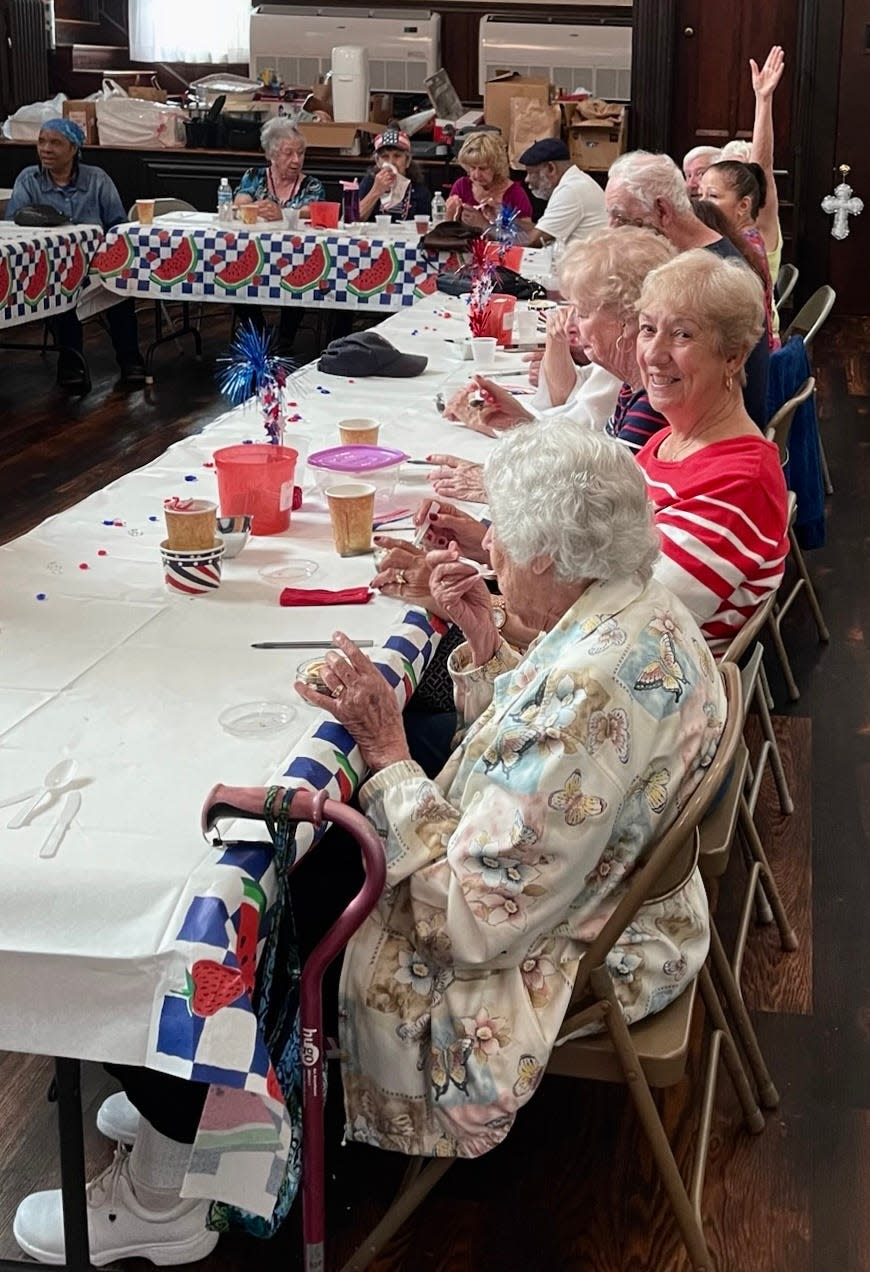 Local senior citizens are seen here in this undated photo after having been served lunch by Our Daily Bread soup kitchen volunteers in St. Thomas Episcopal Church.