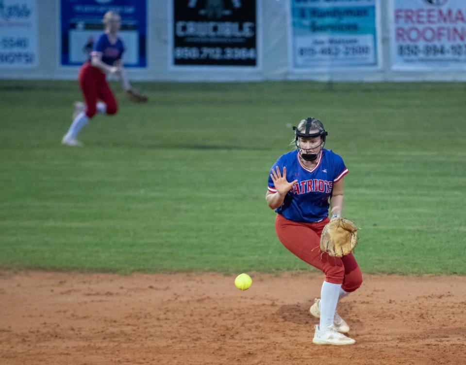 Shortstop Tatum Hasting (7) scoops up a grounder, steps on second and then fires to first for a double play during the South Warren vs Pace softball game at Pace High School on Wednesday, April 5, 2023.