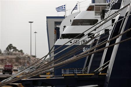 Ships are seen anchored during a 24-hour general labour strike at the port of Piraeus near Athens November 6, 2013. REUTERS/Yorgos Karahalis