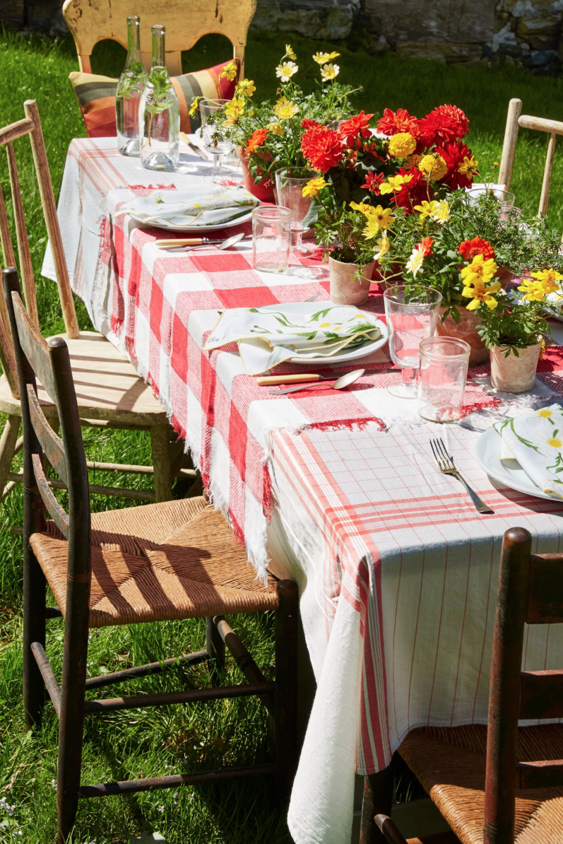 <p>Keep your Easter brunch casual with this DIY layered tablecloth, which incorporates vintage linens. Use pinking shears to create an uneven edge, or simply tear the fabric to create frays.</p><p><a class="link " href="https://www.amazon.com/P-LOTOR-Professional-Stainless-Dressmaking-Scissors/dp/B01AVVVVZA?tag=syn-yahoo-20&ascsubtag=%5Bartid%7C10050.g.1111%5Bsrc%7Cyahoo-us" rel="nofollow noopener" target="_blank" data-ylk="slk:Shop Now;elm:context_link;itc:0">Shop Now</a></p>