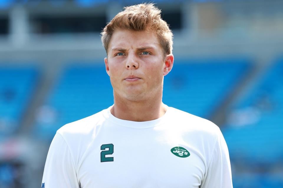 Zach Wilson #2 of the New York Jets looks on prior to the game against the Carolina Panthers at Bank of America Stadium