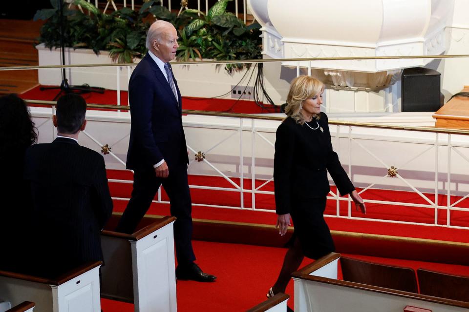 A photo of U.S. President Joe Biden and First Lady Jill Biden attending a tribute service for former First Lady Rosalynn Carter.