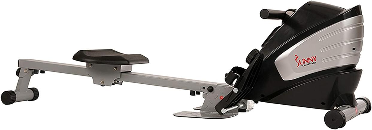 Grey rowing machine with black seat.