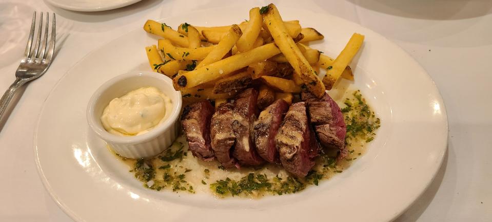 Tenderloin with chimichurri sauce and fries is one of three entree selections for Capital Grille's $28 lunch "Plates" special.