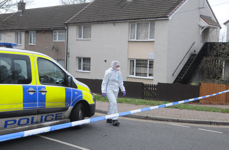 A forensic officer near the scene in Deedmore Road, Wood End, Coventry, after a a 16-year-old was stabbed to death (PA)