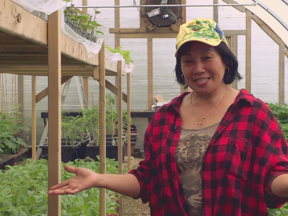 Rezel Rossignol, who grew up in a small farming village in the Philippines, credits her upbringing for nurturing her love for plants.   (Aniekan Etuhube/CBC - image credit)