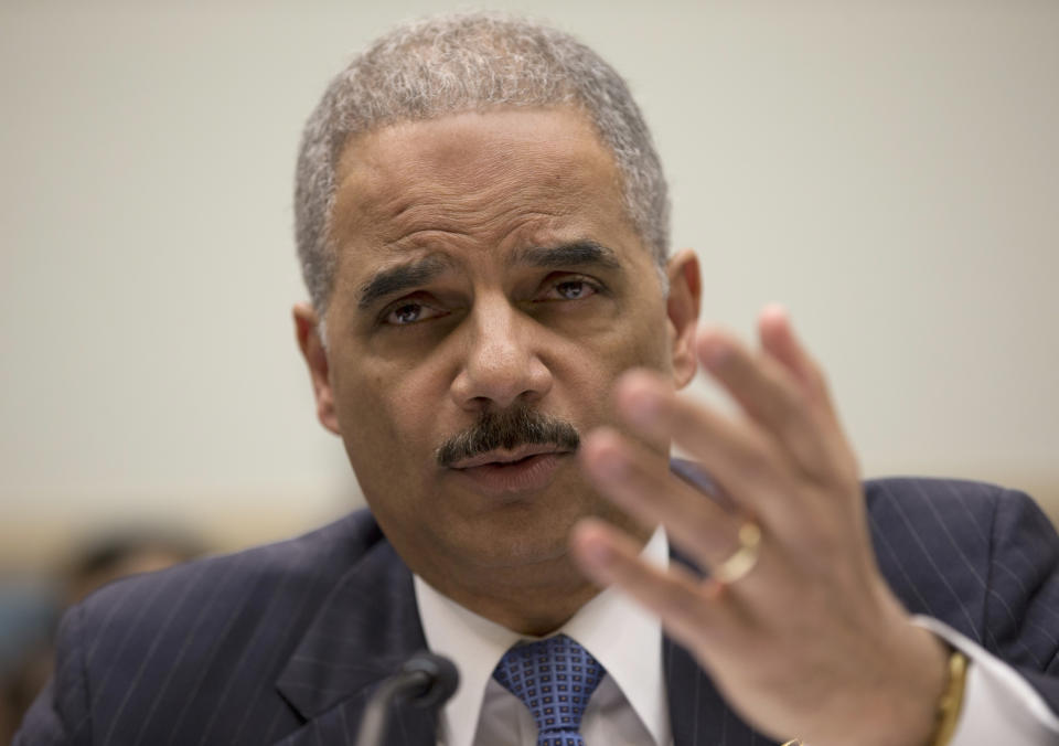 Attorney General Eric Holder testifies on Capitol Hill in Washington, Wednesday, May 15, 2013, before the House Judiciary Committee oversight hearing on the Justice Department. Holder is expected to face aggressive questioning on topics ranging from the Justice Department's gathering of phone records at the Associated Press to the government's handling of intelligence before the Boston Marathon bombings. (AP Photo/Carolyn Kaster)