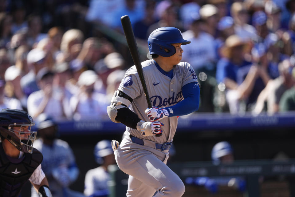 Los Angeles Dodgers' Shohei Ohtani grounds out against Colorado Rockies starting pitcher Ryan Feltner in the fourth inning of a baseball game Sunday, Sept. 29, 2024, in Denver. (AP Photo/David Zalubowski)