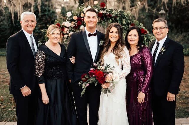 <p>Shannon Lee Miller Photography</p> Ashley and Luke Thomas with both sets of parents on their wedding day