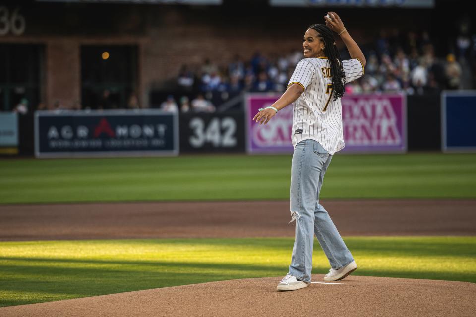 Ronika Stone throws out the ceremonial first pitch before the San Diego Padres' game against the Chicago Cubs on Monday night at Petco Park.