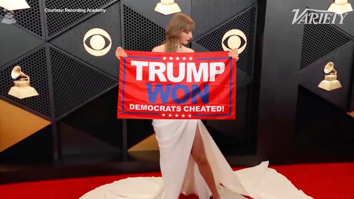 A video purportedly showed Taylor Swift holding up a flag on the red carpet at the 2024 Grammy Awards that said Trump won and Democrats cheated. 