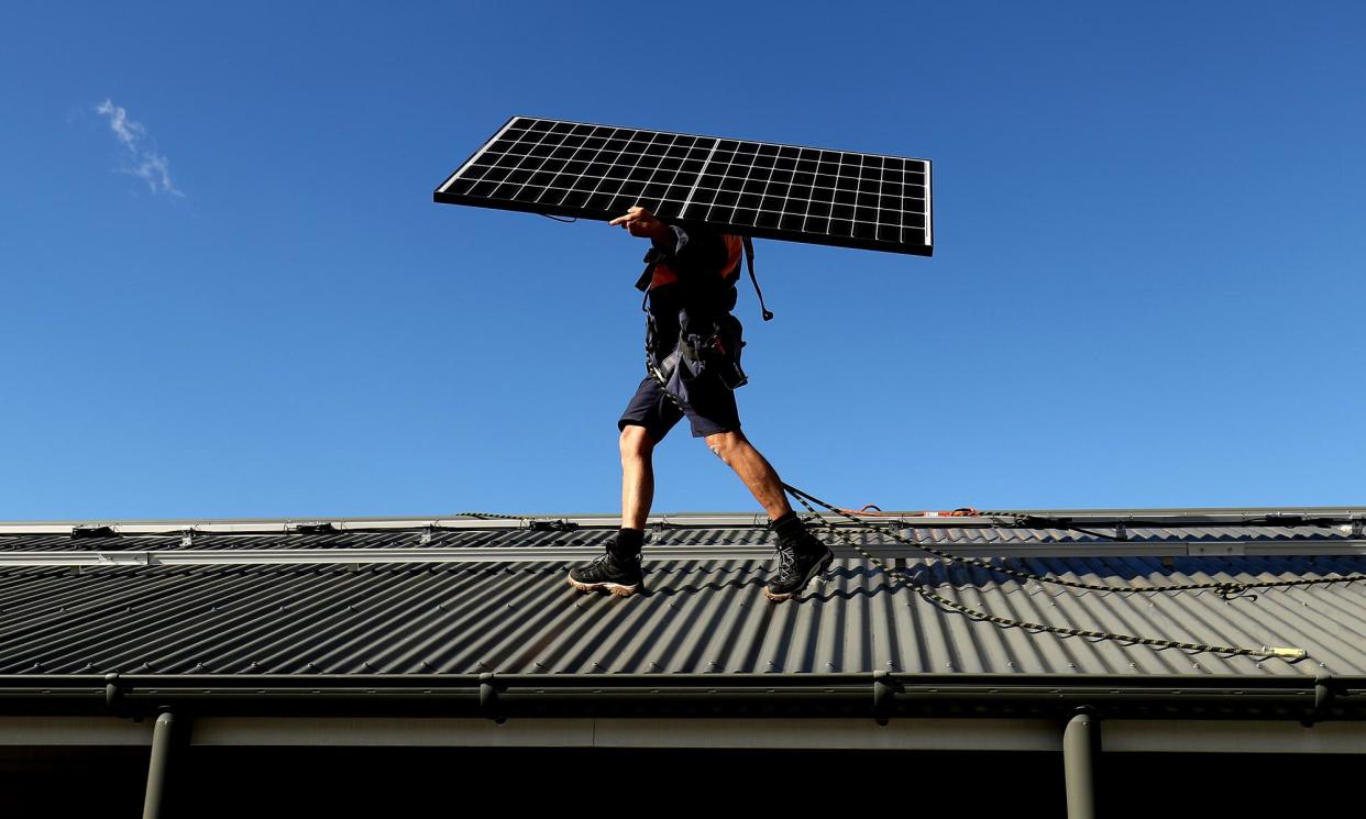 <span>Home owners are opting for smaller solar energy units as cost pressures limit bigger purchases, consultants at Sunwiz say.</span><span>Photograph: Bloomberg/Getty Images</span>