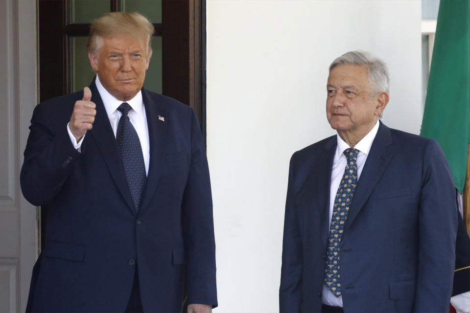 President Donald Trump greets Mexican President Andres Manuel Lopez Obrador at the White House in Washington, Wednesday, July 8, 2020. (AP Photo/Patrick Semansky)