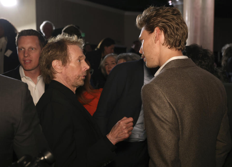 Jerry Bruckheimer, left, and Austin Butler attend the 95th Academy Awards Nominees Luncheon on Monday, Feb. 13, 2023, at the Beverly Hilton Hotel in Beverly Hills, Calif. (Photo by Willy Sanjuan/Invision/AP)