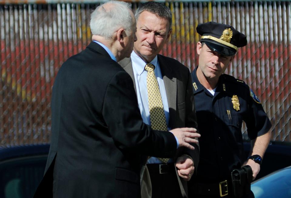 In this photo from May 6, 2013, Steven Sargent, then a deputy police chief, with Police Chief Gary Gemme, center, and funeral home director Peter Stefan outside Graham Putnam and Mahoney Funeral Parlors on Main Street. Stefan had agreed to handle funeral arrangements of Tamerlan Tsarnaev, one of the men who bombed the Boston Marathon.