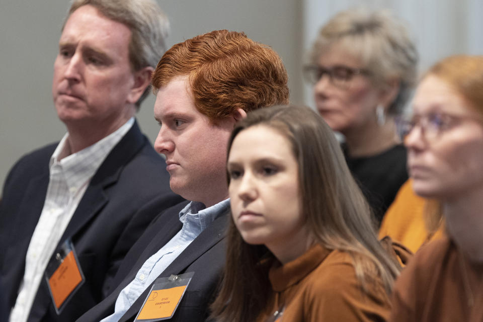 Buster Murdaugh, son of Alex Murdaugh, sits with family and friends during his father's trial for murder at the Colleton County Courthouse in Walterboro, S.C., on Wednesday, Feb. 1, 2023. (Joshua Boucher/The State via AP, Pool)