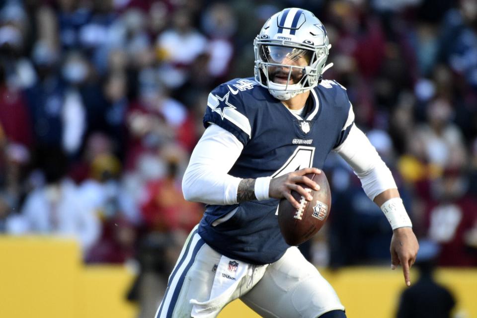 Dallas Cowboys quarterback Dak Prescott scrambles during a win over Washington on Sunday.