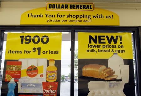 A price sign at a Dollar General store in Arvada, Colorado June 2, 2009. REUTERS/Rick Wilking