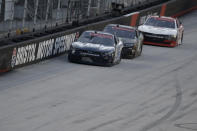 Ryan Sieg (39) drives followed by Riley Herbst (18) and Myatt Snider, right, during NASCAR Xfinity Series auto race at Bristol Motor Speedway Monday, June 1, 2020, in Bristol, Tenn. (AP Photo/Mark Humphrey)