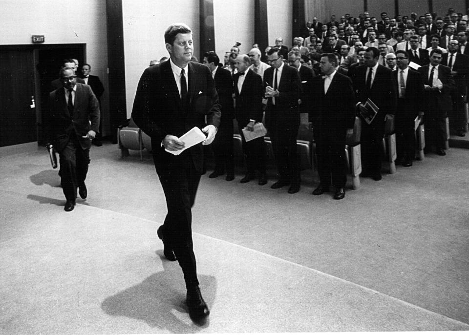 President John F. Kennedy arrives for a press conference on August 30, 1961 in Washington. 