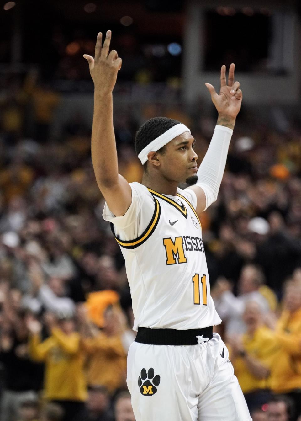 Missouri Tigers guard Isiaih Mosley (11) celebrates after scoring against the Iowa State Cyclones during the first half at Mizzou Arena.