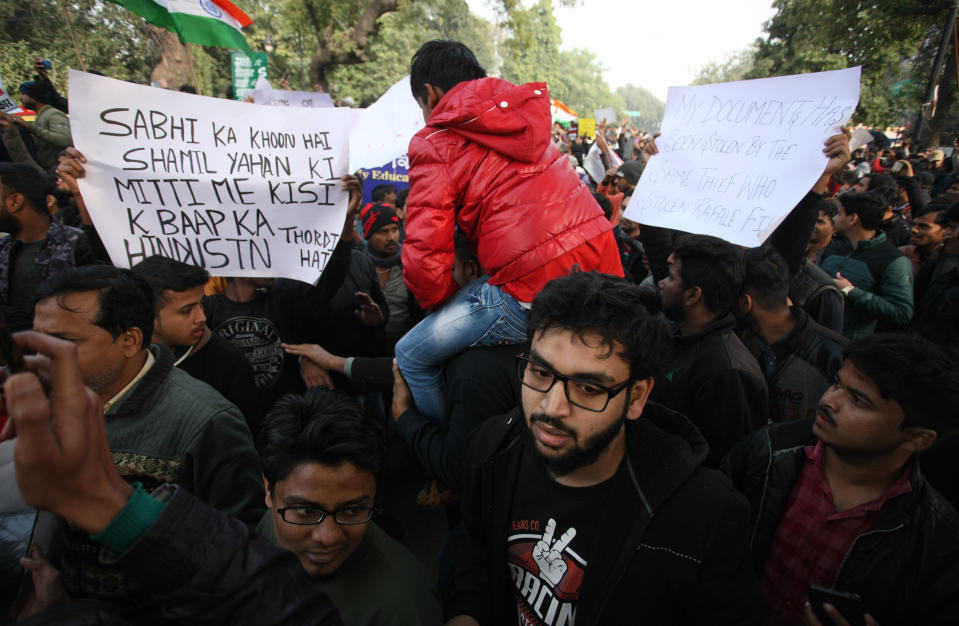 Protesters shout with placards during a demonstration against India's new citizenship law CAA ( Citizenship amandment Act ) in Allahabad on December 19,2019 . Indians defied bans nationwide as anger swells against a citizenship law seen as discriminatory against muslims, following days of protest, clashes, and riots that have left six dead .(Photo by Ritesh Shukla/NurPhoto via Getty Images)