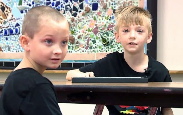 PHOTO: Cashton York and Garrett Brown in the cafeteria at their school in Norman, Okla. (KOCO-TV)