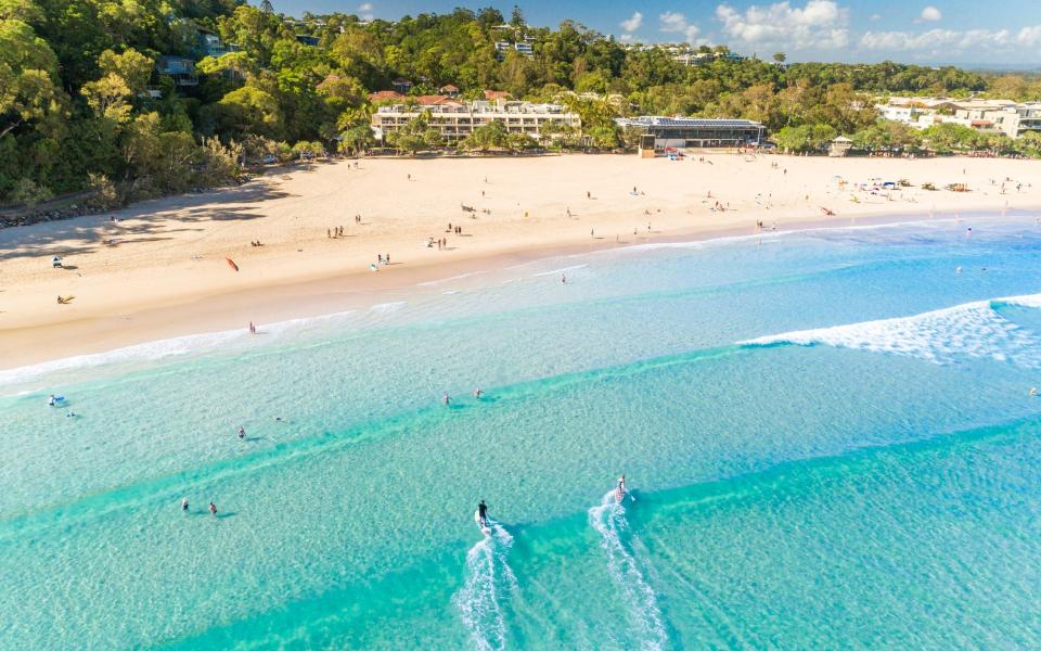 Noosa's main beach is popular with surfers