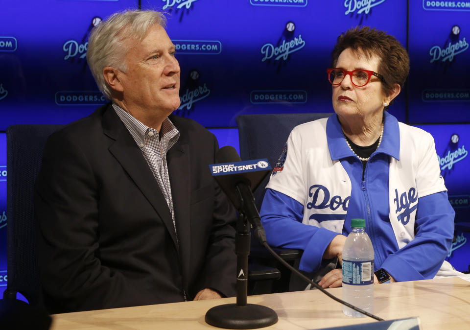 FILE - Los Angeles Dodgers owner & chairman Mark Walter, left, introduces tennis champion Billie Jean King at a news conference in Los Angeles, Sept. 21, 2018. Organizers announced plans Friday, June 30, 2023, to launch a new women’s professional hockey league in January that they hope will provide a stable, economically sustainable home for the sport's top players for years to come. Mark Walter and wife Kimbra, Dodgers team President Stan Kasten and tennis legend Billie Jean King will help run the league.(AP Photo/Alex Gallardo, File)