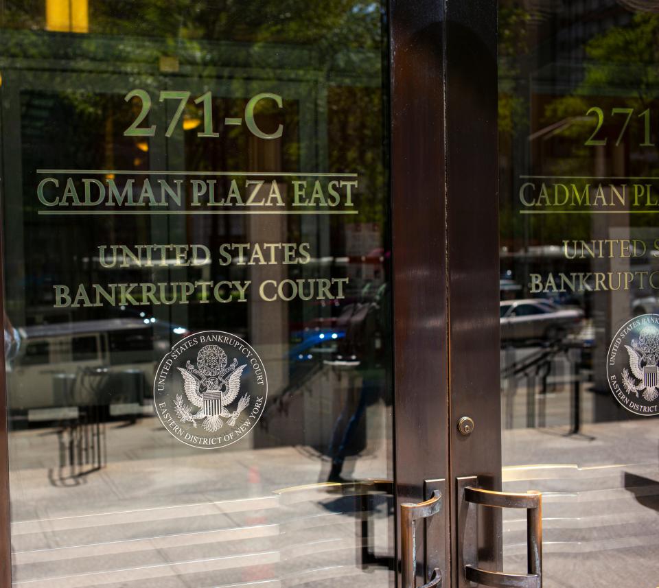 The glass doors at the entrance to the bankruptcy court in Brooklyn.