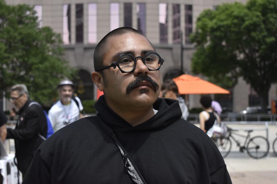 Omar Flores, co-chair of the Coalition to March on the RNC, before the group's Permit March in Red Arrow Park on June 15.