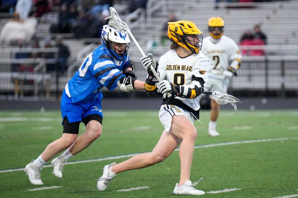 Quinn Crotty (8) is helping to spark Upper Arlington from the midfield.