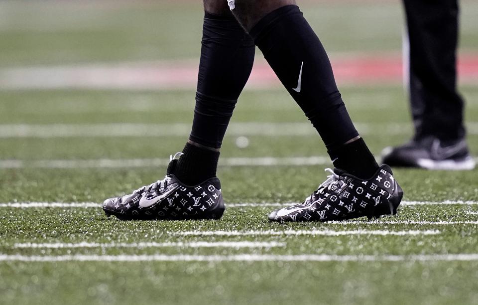 Sep 24, 2022; Columbus, Ohio, USA; Ohio State Buckeyes wide receiver Marvin Harrison Jr. (18) wears some custom shoes in the second quarter of the NCAA football game between Ohio State Buckeyes and Wisconsin Badgers at Ohio Stadium. 