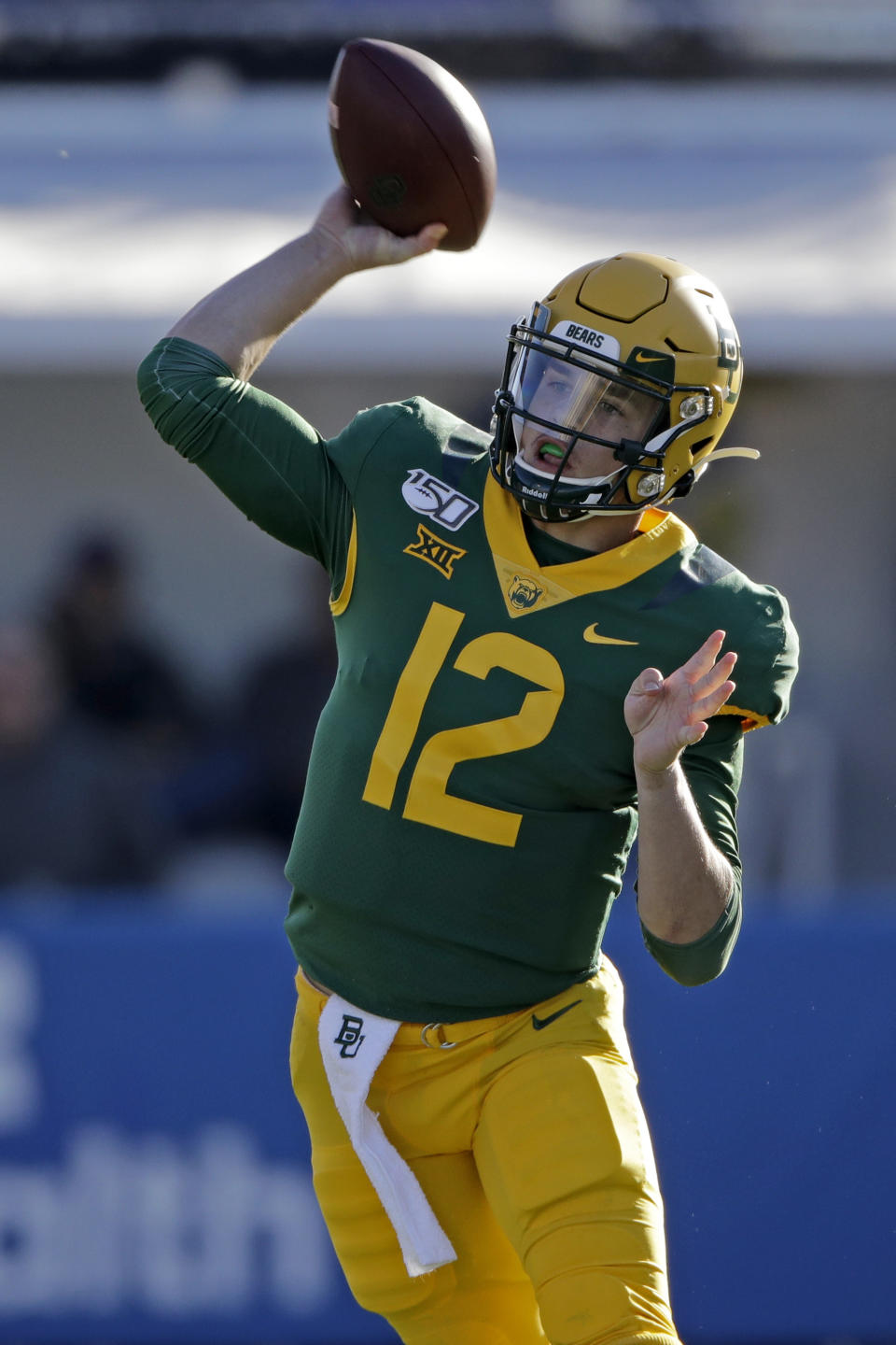 Baylor quarterback Charlie Brewer throws the ball during the first half of an NCAA college football game against Kansas, Saturday, Nov. 30, 2019, in Lawrence, Kan. (AP Photo/Charlie Riedel)