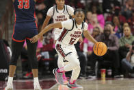 South Carolina guard MiLaysia Fulwiley (12) pushes the ball up the court after a rebound during the first half of an NCAA college basketball game against Mississippi Sunday, Feb. 4, 2024, in Columbia, S.C. (AP Photo/Artie Walker Jr.)