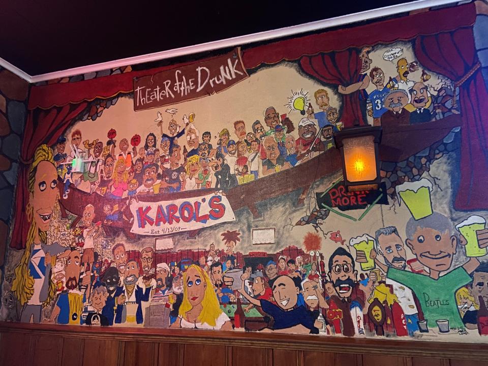 Matthew Keenan painted a mural at Karol's Pub in Wallington in 2009.